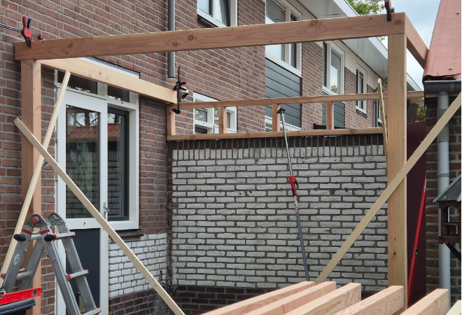 De constructie van een Douglas hout overkapping